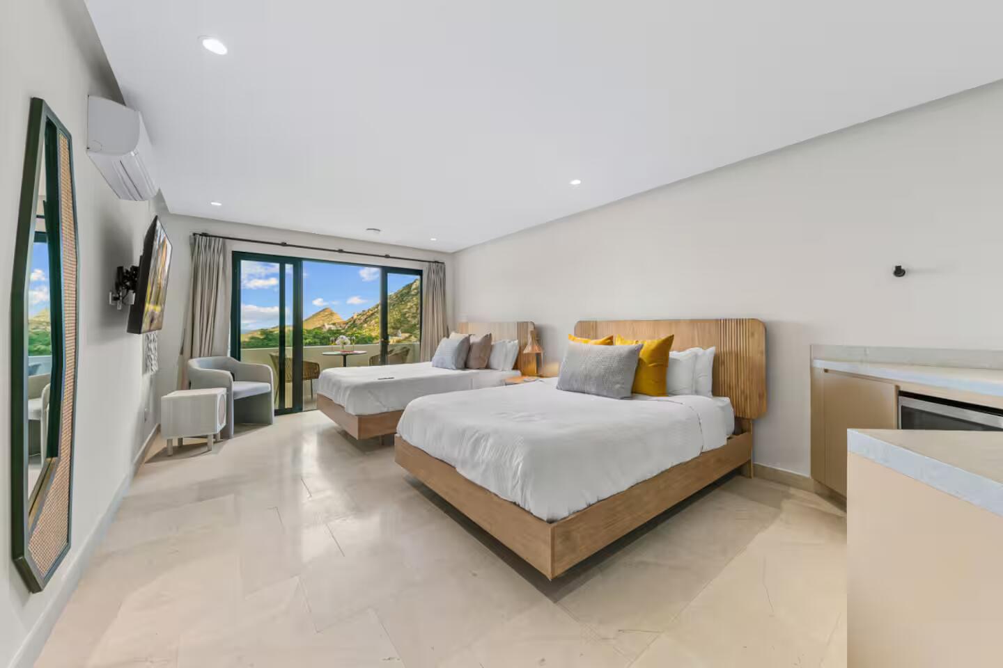 Luxury Cabo villa pool terrace at golden hour